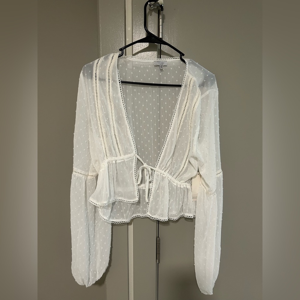 NWT. Tobi white sheer tie top. Size L.